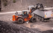 New Loader moving dirt in field,Hitachi Loader moving up with gravel,Loader dropping dirt in truck,Hitachi Wheel Loader moving rocks